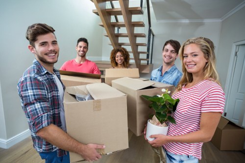 Professional packers handling boxes in Manandvan Chiswick