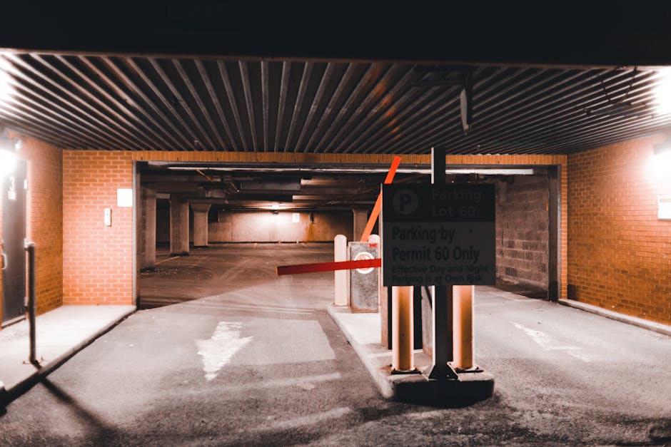 A rectangular white parking sign mounted on a wooden post outdoors, with a blue wheelchair symbol indicating accessible parking and a blue letter 'P' symbol beneath it. To the right of the symbols, th
